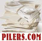 stack of papers and envelopes with pilers.com beneath